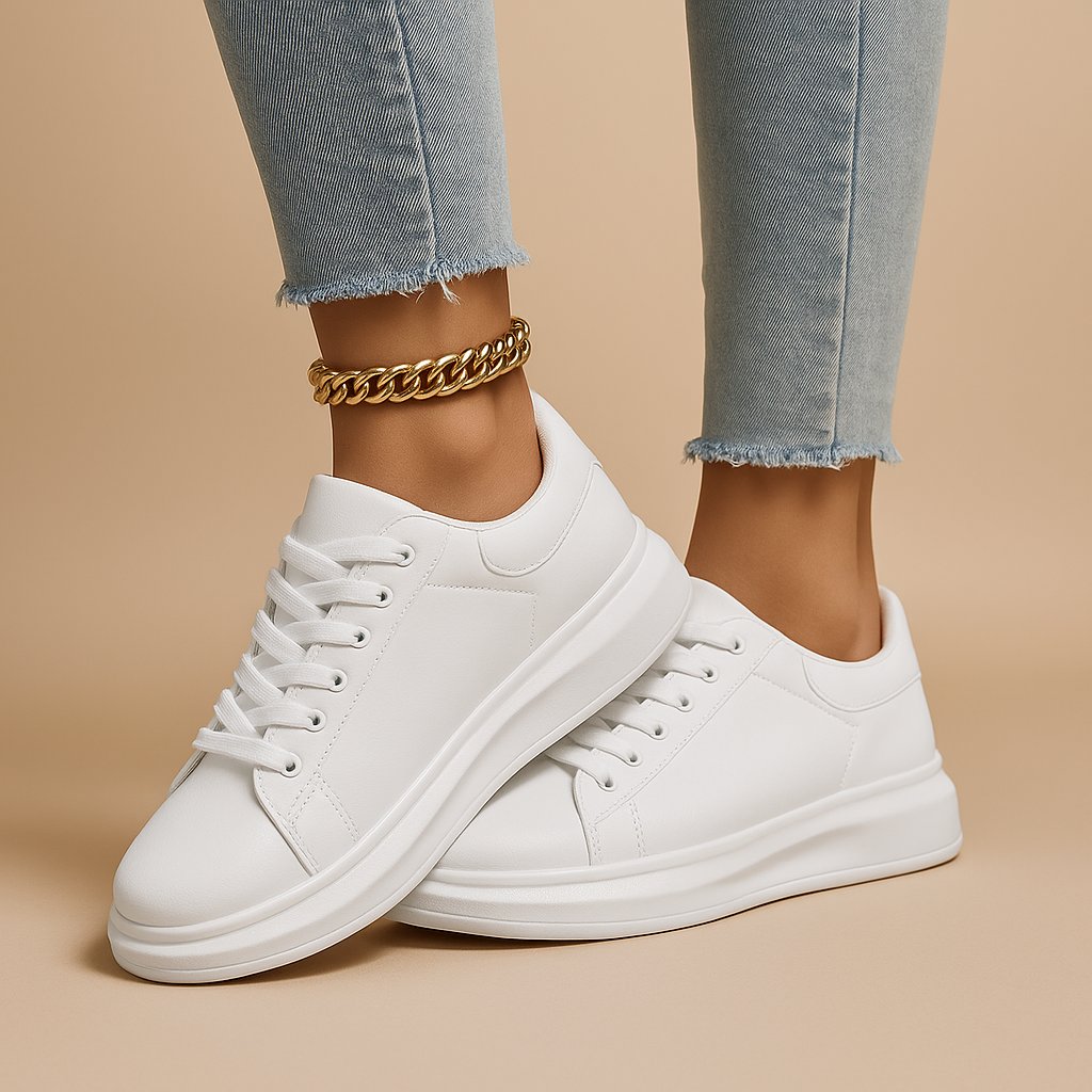 Minimalistyczne białe skórzane sneakersy damskie na platformie - Vera Angle