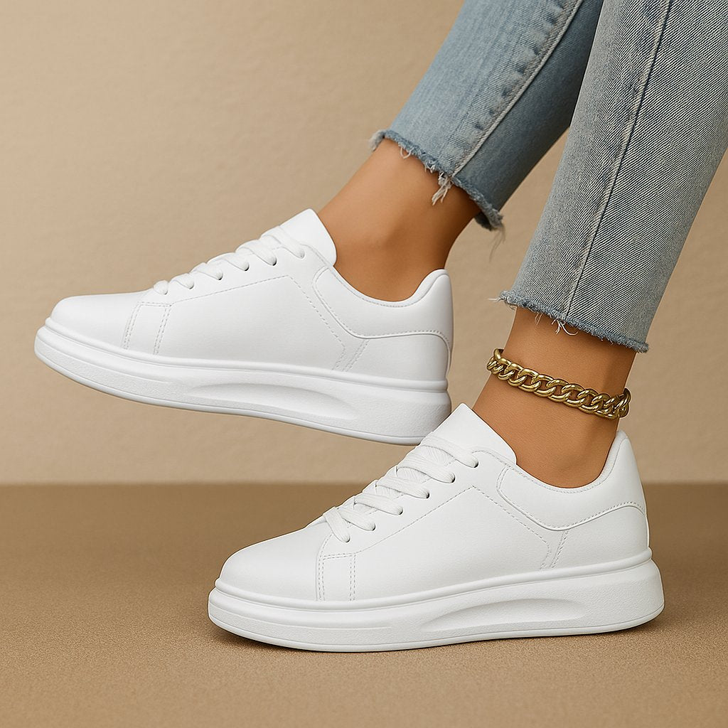 Minimalistyczne białe skórzane sneakersy damskie na platformie - Vera Lifestyle